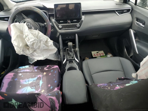 2023 Toyota Corolla Cross XLE with VIN 7MUDAAAG8PV055275, listed as a Copart auction lot 62363375 with 26,106 mi miles and Salvage title. Bid and sale history available at DreamBid. Image 8.