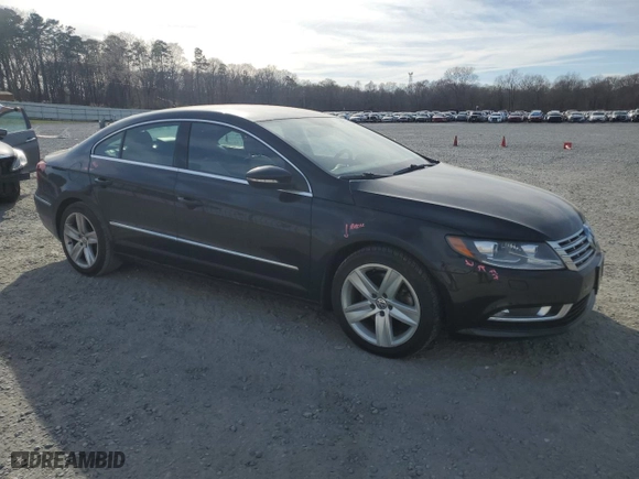 2015 Volkswagen CC R-Line with VIN WVWBP7AN8FE801780, listed as a Copart auction lot 49674445 with 129,528 mi miles and Salvage Title. Bid and sale history available at carsss.com. Image 4.