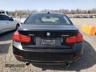 2013 BMW 3 Series 335i xDrive with VIN WBA3B9G58DNR89894, listed as a Copart auction lot 49087945 with 70,141 mi miles and Salvage title. Bid and sale history available at DreamBid. Image 6.