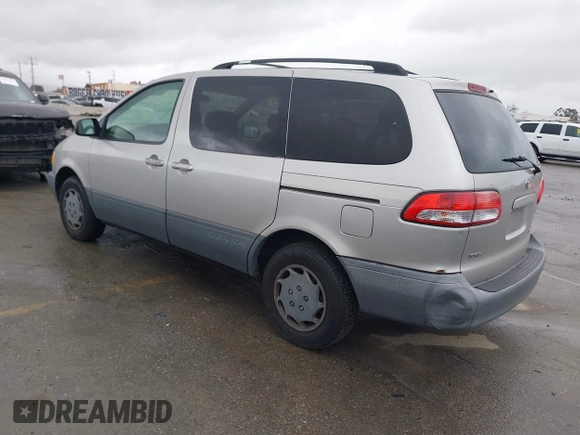 2002 Toyota Sienna CE with VIN 4T3ZF19C02U493816, listed as a IAAI auction lot 41813141 with 216,915 mi miles. Bid and sale history available at carsss.com. Image 3.