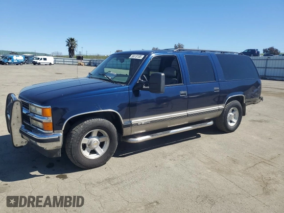 1999 Chevrolet Suburban with VIN 1GNEC16R1XJ394144, listed as a Copart auction lot 50418185 with 173,037 mi miles and Salvage title. Bid and sale history available at DreamBid. Image 1.
