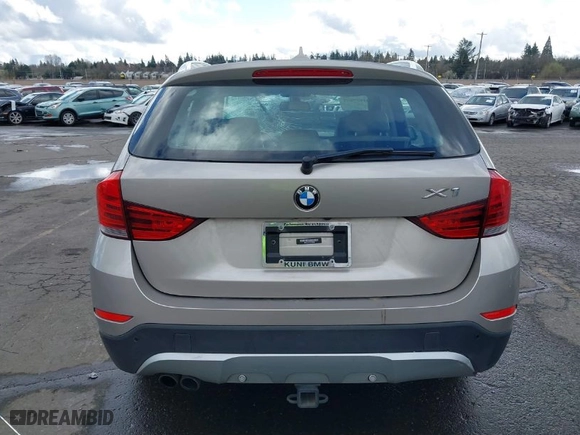 2014 BMW X1 xDrive28i with VIN WBAVL1C51EVY20556, listed as a IAAI auction lot 41699071 with 74,590 mi miles. Bid and sale history available at carsss.com. Image 16.