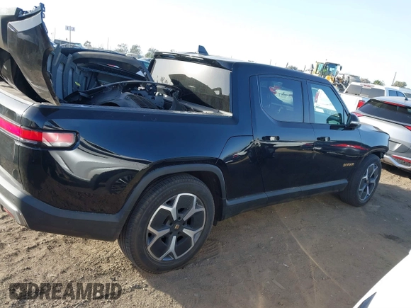 2023 Rivian R1T Adventure with VIN 7FCTGAAAXPN022097, listed as a IAAI auction lot 41235625 with 11,210 mi miles. Bid and sale history available at carsss.com. Image 14.