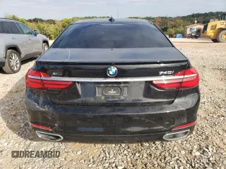 2018 BMW 7 Series 740i xDrive with VIN WBA7E4C5XJGV24003, listed as a Copart auction lot 71395443 with 63,558 mi miles. Bid and sale history available at carsss.com. Image 6.