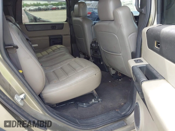 2006 Hummer H2 with VIN 5GRGN23U56H102574, listed as a IAAI auction lot 41955539 with 202,102 mi miles. Bid and sale history available at carsss.com. Image 8.