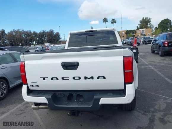 2024 Toyota Tacoma 4WD SR5 with VIN 3TYLB5JNXRT007339, listed as a IAAI auction lot 41432778 with 4,038 mi miles. Bid and sale history available at carsss.com. Image 16.
