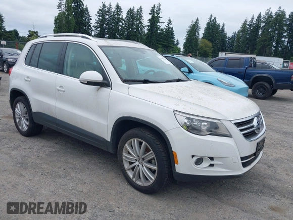 2010 Volkswagen Tiguan with VIN WVGBV9AX2AW513478, listed as a IAAI auction lot 42607466 with 63,780 mi miles and . Bid and sale history available at DreamBid. Image 1.