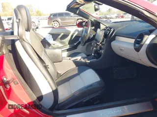 2007 Mercedes-Benz SLK 55 AMG with VIN WDBWK73F07F150189, listed as a IAAI auction lot 41334201 with 70,634 mi miles and . Bid and sale history available at DreamBid. Image 8.