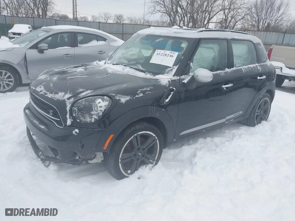2016 MINI Cooper Countryman S with VIN WMWZC3C56GWT11105, listed as a IAAI auction lot 41228246 with 102,971 mi miles. Bid and sale history available at carsss.com. Image 17.