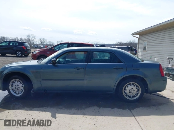 2005 Chrysler 300 with VIN 2C3JA43R45H616682, listed as a IAAI auction lot 41853835 with 158,464 mi miles. Bid and sale history available at carsss.com. Image 14.
