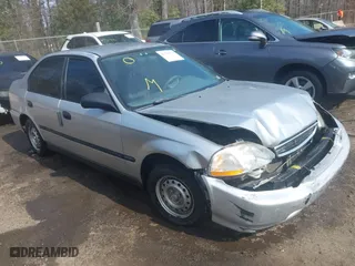 1996 Honda Civic DX with VIN 2HGEJ6627TH550103, listed as a IAAI auction lot 41710877 with 142,608 mi miles. Bid and sale history available at carsss.com. Image 1.