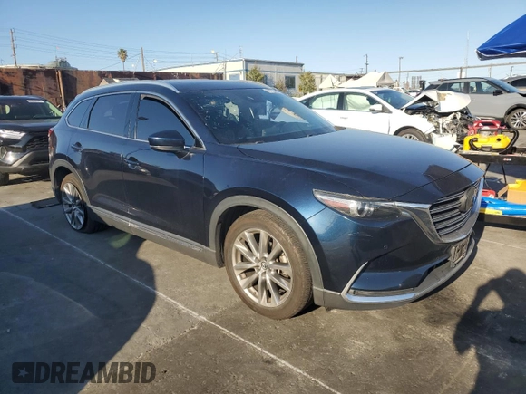 2018 Mazda CX-9 Grand Touring z VIN JM3TCADY3J0207176, wystawiony jako Copart lot #50222325 z przebiegiem 76 856 mil mil oraz Szkoda całkowita • Salvage title. Historia ofert i sprzedaży dostępna na DreamBid. Obrazek 4.
