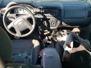 2004 Ford Escape XLS with VIN 1FMYU92134KA21707, listed as a Copart auction lot 72114804 with 219,518 mi miles and Salvage Title. Bid and sale history available at DreamBid. Image 8.