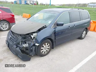 2009 Honda Odyssey EX-L with VIN 5FNRL38769B409281, listed as a IAAI auction lot 42013137 with 213,934 mi miles and . Bid and sale history available at DreamBid. Image 2.