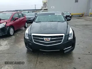 2015 Cadillac ATS Standard RWD z VIN 1G6AA5RA9F0143521, wystawiony jako Copart lot #82045854 z przebiegiem 106 089 mil mil oraz Szkoda całkowita • Salvage title. Historia ofert i sprzedaży dostępna na DreamBid. Obrazek 14.