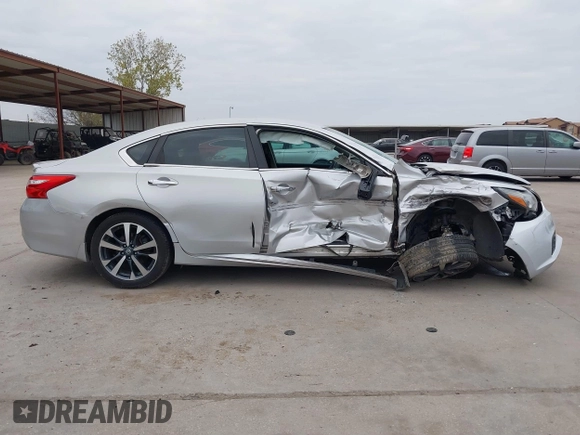 2016 Nissan Altima SL z VIN 1N4BL3APXGC281512, wystawiony jako IAAI lot #41245604 z przebiegiem 123 193 mil mil oraz . Historia ofert i sprzedaży dostępna na DreamBid. Obrazek 13.