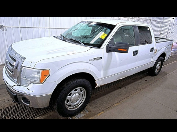 2011 Ford F-150 XL with VIN 1FTFW1EF5BKD48377, listed as a IAAI auction lot 42132364 with 204,145 mi miles. Bid and sale history available at carsss.com. Image 1.