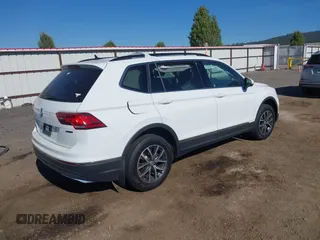 2020 Volkswagen Tiguan SE with VIN 3VV2B7AXXLM053170, listed as a IAAI auction lot 42203372 with 112,794 mi miles and . Bid and sale history available at DreamBid. Image 4.
