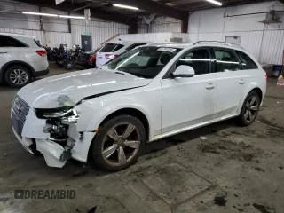 2014 Audi allroad Premium Plus with VIN WA1UFAFL9EA066453, listed as a Copart auction lot 87761015 with 100,193 mi miles and Salvage Title. Bid and sale history available at carsss.com. Image 1.