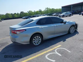 2020 Toyota Camry LE with VIN 4T1C11AK9LU341762, listed as a IAAI auction lot 42001577 with 84,991 mi miles and . Bid and sale history available at DreamBid. Image 4.