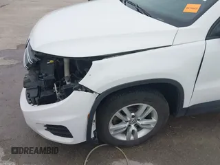 2013 Volkswagen Tiguan S z VIN WVGAV3AX6DW610678, wystawiony jako IAAI lot #41544865 z przebiegiem 102 948 mil mil oraz . Historia ofert i sprzedaży dostępna na DreamBid. Obrazek 18.