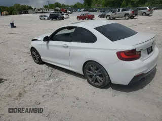 2015 BMW 2 Series M235i xDrive with VIN WBA1J9C59FVX99024, listed as a Copart auction lot 49821773 with 136,791 mi miles. Bid and sale history available at carsss.com. Image 2.