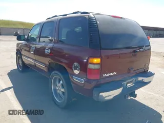 2001 GMC Yukon SLT with VIN 1GKEK13V81J100005, listed as a IAAI auction lot 42090494 with 276,042 mi miles. Bid and sale history available at carsss.com. Image 3.