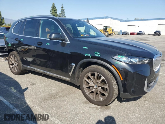 2025 BMW X5 sDrive40i with VIN 5UX13EU05S9W82678, listed as a Copart auction lot 49857255 with 9,901 mi miles and Salvage Title. Bid and sale history available at carsss.com. Image 4.