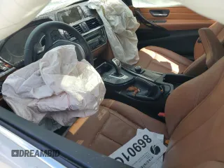 2015 BMW 4 Series 435i с VIN WBA3R1C55FK194700, выставлен на аукционе Copart как лот 53197794 с пробегом Не указан миль и Списание • Salvage title. История ставок и продаж доступна на DreamBid. Изображение 8.