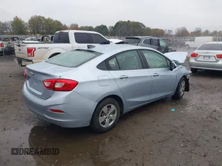 2018 Chevrolet Cruze LS with VIN 1G1BC5SMXJ7197516, listed as a IAAI auction lot 41033980 with 124,058 mi miles and . Bid and sale history available at DreamBid. Image 4.