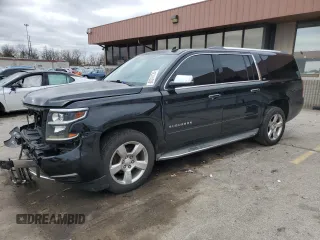 2015 Chevrolet Suburban LTZ with VIN 1GNSKKKC2FR210617, listed as a Copart auction lot 80241124 with 225,602 mi miles and Salvage Title. Bid and sale history available at carsss.com. Image 1.