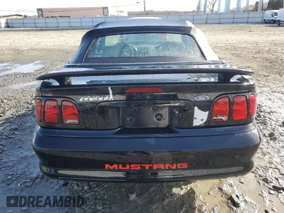 1998 Ford Mustang with VIN 1FAFP4449WF153210, listed as a Copart auction lot 44126725 with 143,249 mi miles and Salvage Title. Bid and sale history available at carsss.com. Image 6.