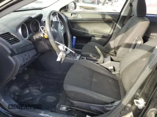 2016 Mitsubishi Lancer ES with VIN JA32U2FU5GU001861, listed as a Copart auction lot 76461034 with 136,135 mi miles and Salvage Title. Bid and sale history available at DreamBid. Image 7.