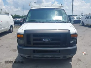 2011 Ford Econoline Cargo Commercial with VIN 1FTNE2EL4BDA70800, listed as a IAAI auction lot 42523533 with 139,962 mi miles and . Bid and sale history available at DreamBid. Image 12.