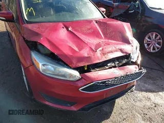 2017 Ford Focus SE z VIN 1FADP3F29HL256838, wystawiony jako IAAI lot #41875356 z przebiegiem 178 673 mil mil oraz . Historia ofert i sprzedaży dostępna na DreamBid. Obrazek 6.
