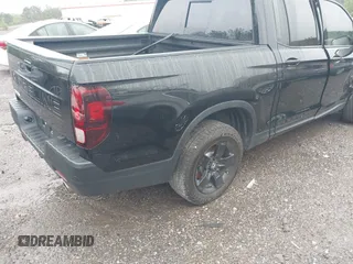 2024 Honda Ridgeline Black Edition with VIN 5FPYK3F82RB021790, listed as a IAAI auction lot 41962656 with 12,319 mi miles and . Bid and sale history available at DreamBid. Image 4.