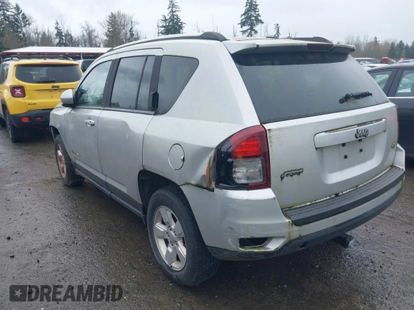 2014 Jeep Compass Latitude with VIN 1C4NJCEAXED522723, listed as a IAAI auction lot 41907230 with 98,252 mi miles and . Bid and sale history available at carsss.com. Image 3.