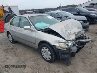 1999 Honda Accord LX z VIN 1HGCG5646XA147476, wystawiony jako IAAI lot #41752857 z przebiegiem 86 339 mil mil oraz . Historia ofert i sprzedaży dostępna na DreamBid. Obrazek 1.