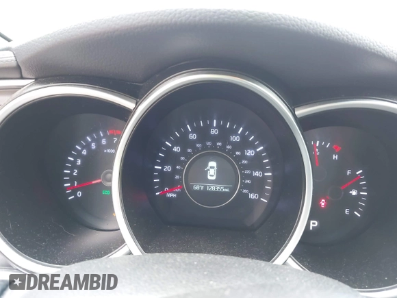 2015 Kia Optima EX with VIN 5XXGN4A77FG497218, listed as a IAAI auction lot 42464839 with 128,355 mi miles and . Bid and sale history available at DreamBid. Image 7.