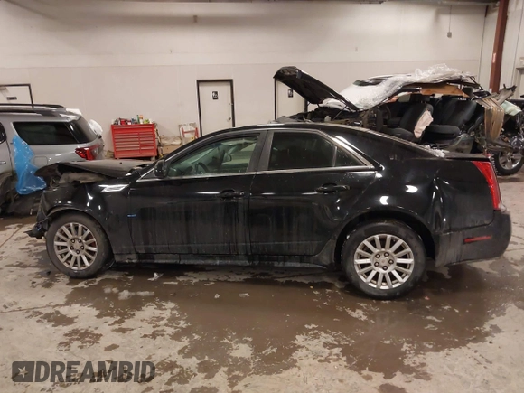 2010 Cadillac CTS with VIN 1G6DA5EG0A0110892, listed as a IAAI auction lot 41321333 with 112,851 mi miles and . Bid and sale history available at DreamBid. Image 14.
