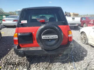 1999 Chevrolet Tracker z VIN 2CNBE1862X6931542, wystawiony jako Copart lot #72216254 z przebiegiem 179 527 mil mil oraz Szkoda całkowita • Salvage title. Historia ofert i sprzedaży dostępna na DreamBid. Obrazek 6.