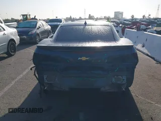2014 Chevrolet Camaro LT z VIN 2G1FB1E35E9126793, wystawiony jako IAAI lot #41959896 z przebiegiem Nie podano mil oraz . Historia ofert i sprzedaży dostępna na DreamBid. Obrazek 17.