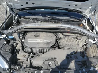 2020 BMW X1 xDrive28i with VIN WBXJG9C00L5P60455, listed as a Copart auction lot 52353875 with 77,709 mi miles and Salvage Title. Bid and sale history available at carsss.com. Image 12.