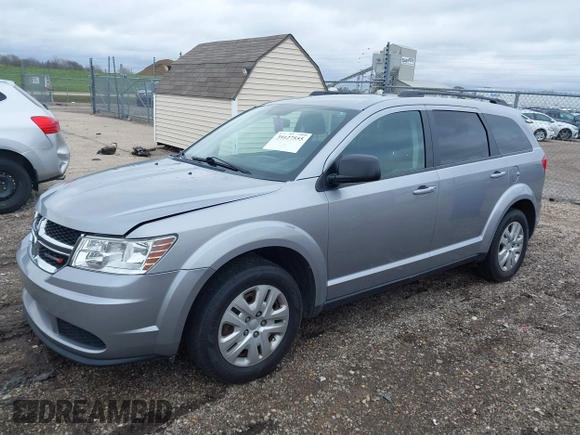 2016 Dodge Journey SE with VIN 3C4PDCAB4GT230643, listed as a IAAI auction lot 39127555 with 102,756 mi miles. Bid and sale history available at carsss.com. Image 2.