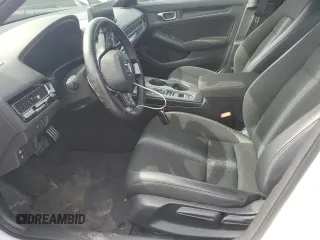 2022 Honda Civic Sport z VIN 2HGFE2F57NH550455, wystawiony jako Copart lot #52005235 z przebiegiem 31 396 mil mil oraz Szkody całkowita. Historia ofert i sprzedaży dostępna na DreamBid. Obrazek 7.