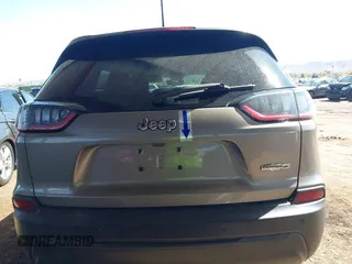 2021 Jeep Cherokee Altitude with VIN 1C4PJLLBXMD155096, listed as a IAAI auction lot 41746319 with 99,423 mi miles and . Bid and sale history available at DreamBid. Image 17.