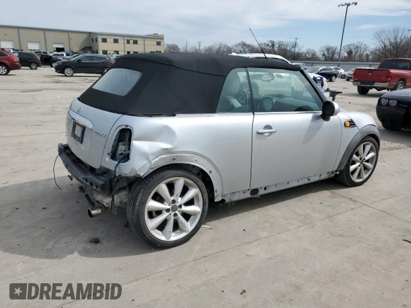 2011 MINI Convertible with VIN WMWZN3C53BTZ89332, listed as a Copart auction lot 45945515 with 25,809 mi miles and Salvage title. Bid and sale history available at DreamBid. Image 3.
