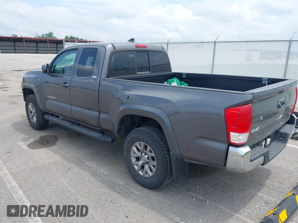 2017 Toyota Tacoma SR with VIN 5TFSX5EN9HX052395, listed as a IAAI auction lot 42290149 with 140,655 mi miles and . Bid and sale history available at DreamBid. Image 3.