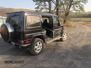 2003 Mercedes-Benz G-Class with VIN WDCYR49E33X141312, listed as a Copart auction lot 50188485 with 146,986 mi miles and Salvage Title. Bid and sale history available at carsss.com. Image 4.