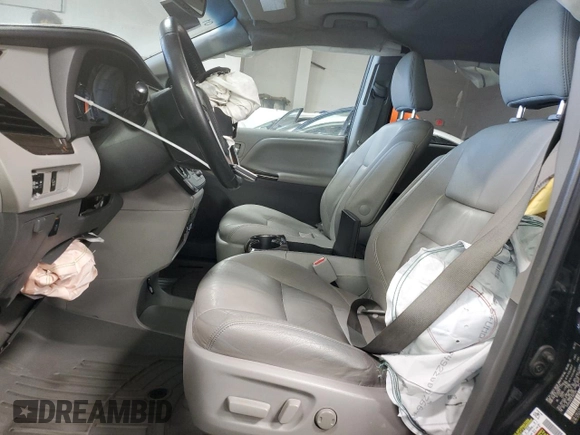 2015 Toyota Sienna XLE с VIN 5TDYK3DC9FS601304, выставлен на аукционе Copart как лот 51118295 с пробегом 153 121 миль миль и Списание • Salvage title. История ставок и продаж доступна на DreamBid. Изображение 7.